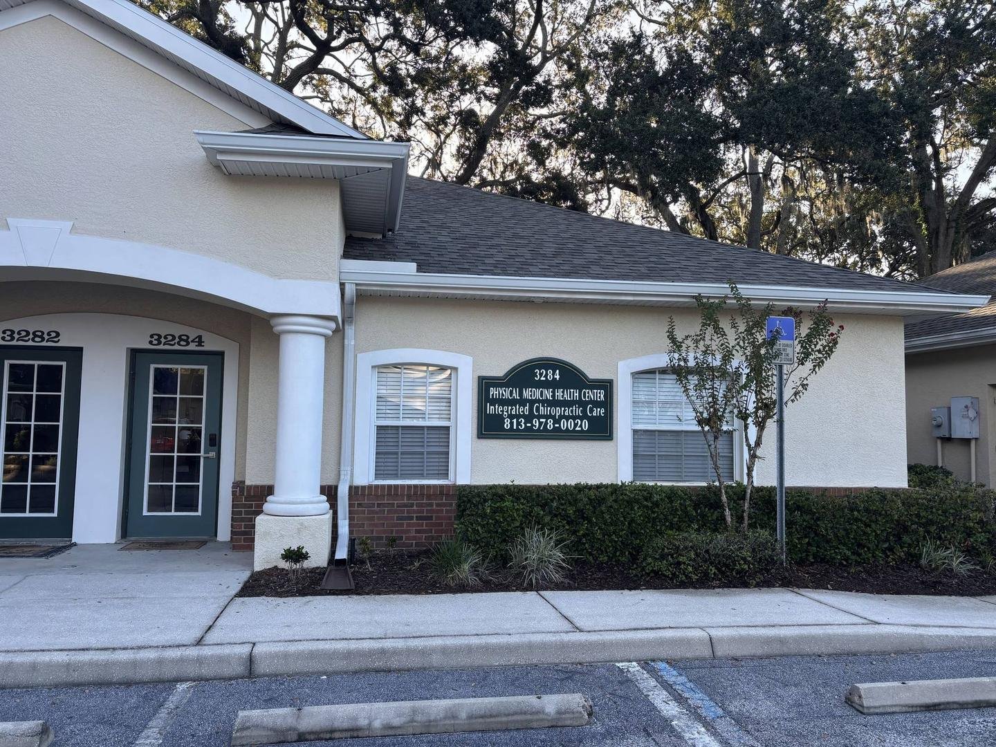 Physical Medicine Health Center clinic entrance at 3284 Cove Bend Drive, Tampa, FL